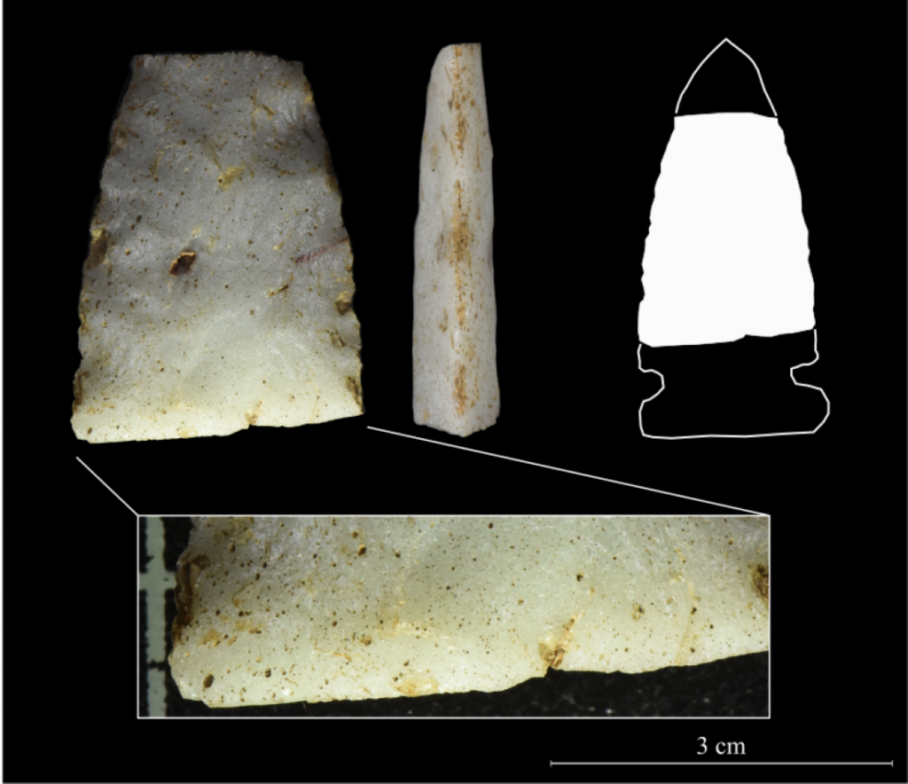 A projectile point fragment, manufactured from Tertiary Hills Clinker; recovered by Ember Archaeologists.
